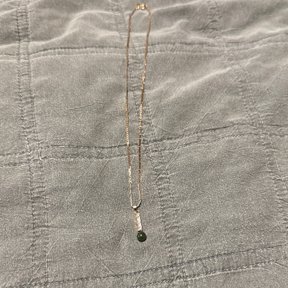 Delicate Gold Necklace with Green Stone Pendant